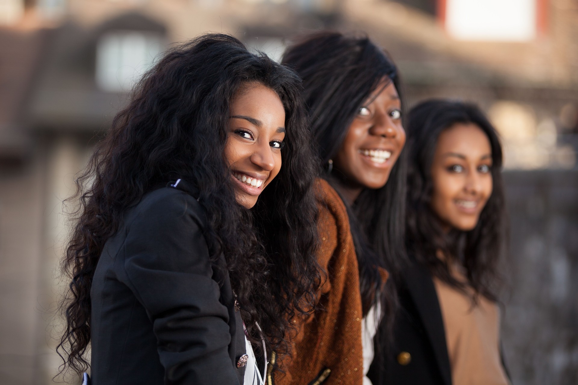 Three smiling, teenage, African American girls
